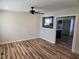Dining area with modern vinyl floors, ceiling fan, and seamless transition to the kitchen at 938 Rebel Forest Se Dr, Atlanta, GA 30315