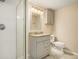 Bathroom features a stand up shower, granite vanity top, and modern fixtures at 1922 Willa Dr, Decatur, GA 30032