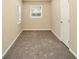 Bedroom includes two windows providing ample natural light and an updated ceiling fan at 1922 Willa Dr, Decatur, GA 30032