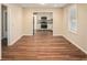 Open-concept dining area leading to kitchen with stainless steel appliances at 1922 Willa Dr, Decatur, GA 30032