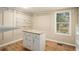 Spacious walk-in closet with granite island, shelving and ample storage space at 1922 Willa Dr, Decatur, GA 30032