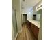 Bathroom featuring a double vanity, a walk-in closet, and a glass-door shower at 1965 Nocturne Dr # 1103, Alpharetta, GA 30009