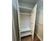 Interior view of closet with hanging rod and shelf, offering practical storage solutions at 1965 Nocturne Dr # 1103, Alpharetta, GA 30009