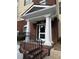Welcoming condo building entrance with columns and decorative details at 1965 Nocturne Dr # 1103, Alpharetta, GA 30009