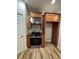 Modern kitchen with stainless steel oven and plenty of cabinet storage space at 1965 Nocturne Dr # 1103, Alpharetta, GA 30009