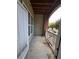Private patio with wood railing and a partial view of the outdoors at 1965 Nocturne Dr # 1103, Alpharetta, GA 30009