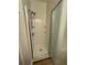 Close up of the shower with white tile surround and glass door at 1965 Nocturne Dr # 1103, Alpharetta, GA 30009