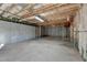 Unfinished basement featuring exposed wooden beams, concrete floors and walls at 4360 Autry Way, Alpharetta, GA 30022