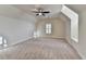 Spacious carpeted bedroom with natural light and ceiling fan at 4360 Autry Way, Alpharetta, GA 30022