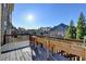 Spacious wooden deck overlooking the landscape on a sunny day at 4360 Autry Way, Alpharetta, GA 30022