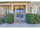 Inviting front entrance with stone steps, elegant pillars, and dual hanging lanterns at 4360 Autry Way, Alpharetta, GA 30022