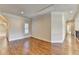 Upstairs landing features hardwood floors, crown molding and natural light at 4360 Autry Way, Alpharetta, GA 30022