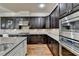 Stylish kitchen with stainless steel appliances, gas cooktop, and granite countertops at 4360 Autry Way, Alpharetta, GA 30022