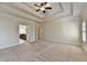 View of a large main bedroom leading to the bathroom and closet at 4360 Autry Way, Alpharetta, GA 30022