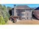 Charming brick home featuring a spacious deck and a walkout basement on a gently sloping lot at 4360 Autry Way, Alpharetta, GA 30022