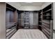 Spacious walk-in closet with custom shelving and drawers for optimal storage and organization at 4360 Autry Way, Alpharetta, GA 30022