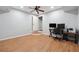 Finished basement offers versatile space with wood flooring, recessed lighting, and neutral walls at 710 Melanie Ct, Canton, GA 30115
