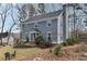 Classic home showcasing its front yard, landscaping, and architectural details at 710 Melanie Ct, Canton, GA 30115