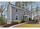 Charming two-story home featuring a well-maintained lawn, a cozy entrance, and classic architectural details at 710 Melanie Ct, Canton, GA 30115