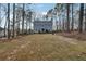 Expansive front yard of home with mature trees offering shade and privacy at 710 Melanie Ct, Canton, GA 30115