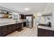Renovated kitchen with stone countertops, stainless steel appliances, and subway tile backsplash at 710 Melanie Ct, Canton, GA 30115