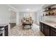 Breakfast nook with a view from the kitchen, features backyard access and ample lighting at 710 Melanie Ct, Canton, GA 30115