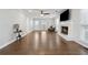 Bright living room with hardwood floors, fireplace, and ample natural light at 710 Melanie Ct, Canton, GA 30115
