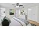 Spacious bedroom with decor, closet, and view to renovated bathroom at 3825 Lavista Rd # Q3, Tucker, GA 30084