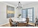 Dining area with seating for four and sliding glass patio doors to the back yard at 3825 Lavista Rd # Q3, Tucker, GA 30084