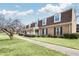 Manicured front lawn leading to a brick townhouse complex at 3825 Lavista Rd # Q3, Tucker, GA 30084