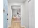 Hallway view leading to a living room with contemporary decor and lots of light at 3825 Lavista Rd # Q3, Tucker, GA 30084