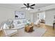 Bright living room with modern furniture, neutral colors, and lots of light at 3825 Lavista Rd # Q3, Tucker, GA 30084