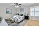 Well-appointed bedroom with ceiling fan, shuttered window, and tasteful decor at 3825 Lavista Rd # Q3, Tucker, GA 30084
