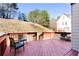 Exterior back porch offering a relaxing outdoor space with chairs at 4766 Longcourt Se Dr, Atlanta, GA 30339