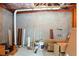 Unfinished basement with exposed ceiling, concrete walls, and potential for customization at 4766 Longcourt Se Dr, Atlanta, GA 30339