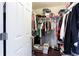 Walk in closet with metal shelving units for optimal storage at 4766 Longcourt Se Dr, Atlanta, GA 30339