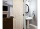 View of the half bathroom and living area at 4766 Longcourt Se Dr, Atlanta, GA 30339