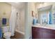 Bathroom with shower/tub, vanity and built in shelving, offering storage and style at 57 Forsyth St # 13D, Atlanta, GA 30303
