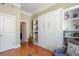 Living area with built-in murphy bed and shelves, offering an easy space-saving solution and plenty of storage at 57 Forsyth St # 13D, Atlanta, GA 30303