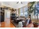 Cozy living room with hardwood floors, comfortable seating, and a view of the city at 57 Forsyth St # 13D, Atlanta, GA 30303