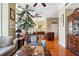 Living room with hardwood floors, large windows, and elegant furnishings at 57 Forsyth St # 13D, Atlanta, GA 30303