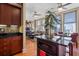 Open living space combining kitchen, dining, and living areas with hardwood floors and city views at 57 Forsyth St # 13D, Atlanta, GA 30303