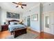 Serene main bedroom with ensuite bathroom, hardwood floors, and a calming color scheme at 57 Forsyth St # 13D, Atlanta, GA 30303