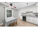 Eat-in kitchen featuring light-colored tile floors, window and dining table at 747 Houston Mill Ne Rd # 1, Atlanta, GA 30329