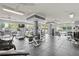 Well-lit gym featuring treadmills, weights, and other exercise equipment for residents' fitness needs at 10 Perimeter Summit Ne Blvd # 2112, Atlanta, GA 30319