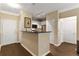 Well-designed kitchen with stainless appliances, modern cabinets, and a convenient breakfast bar at 10 Perimeter Summit Ne Blvd # 2112, Atlanta, GA 30319