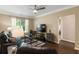 The living room is bright and airy, with a comfortable leather sofa at 10 Perimeter Summit Ne Blvd # 2112, Atlanta, GA 30319