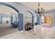 Elegant building lobby with tiled floors, a chandelier, and seating areas for residents and guests at 10 Perimeter Summit Ne Blvd # 2112, Atlanta, GA 30319
