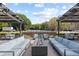 Stylish outdoor lounge area with comfortable seating and a cozy fire pit for community gatherings at 10 Perimeter Summit Ne Blvd # 2112, Atlanta, GA 30319
