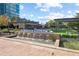 Water feature enhancing the outdoor community space, complemented by modern seating and lush greenery at 10 Perimeter Summit Ne Blvd # 2112, Atlanta, GA 30319